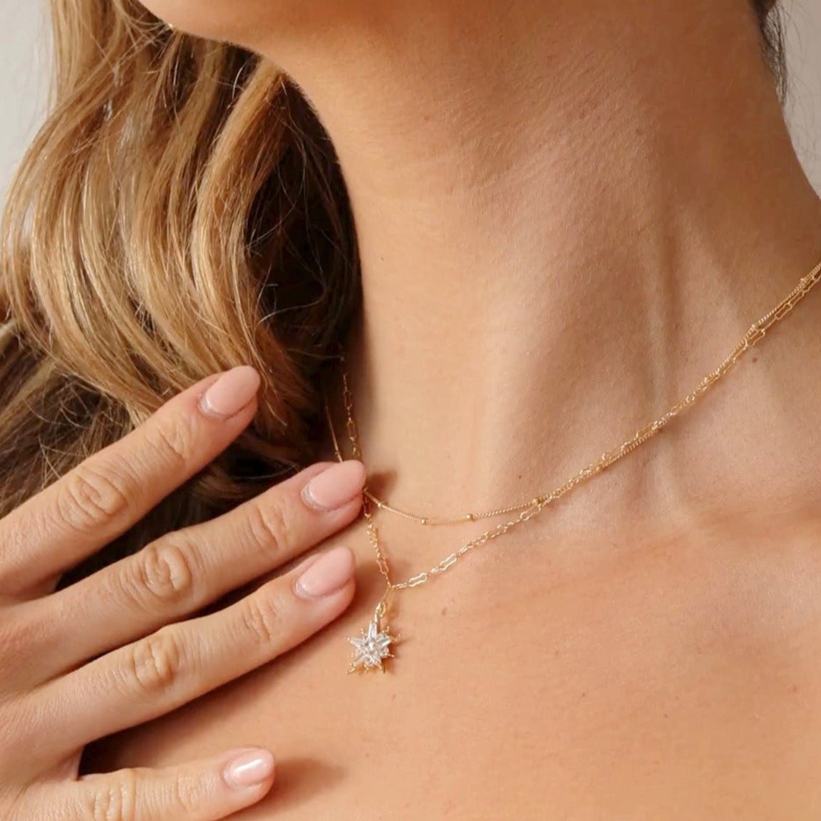 Model wearing the LucyKitty Gold Filled Saturna Chain and Flykra Necklace