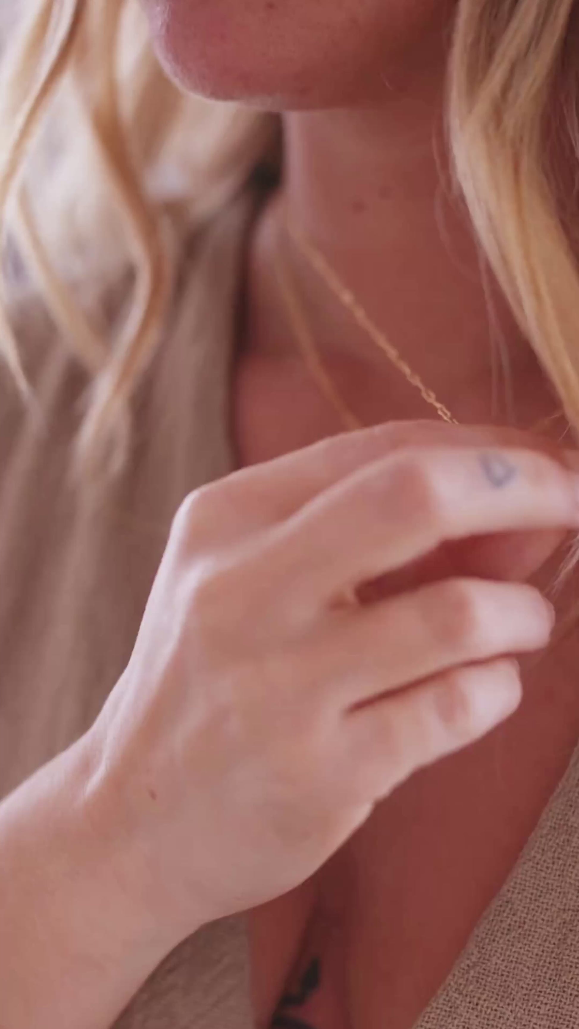 Model wearing LucyKitty Gold Filled Zia Chain and Fayette Birthstone Necklace in March Aquamarine