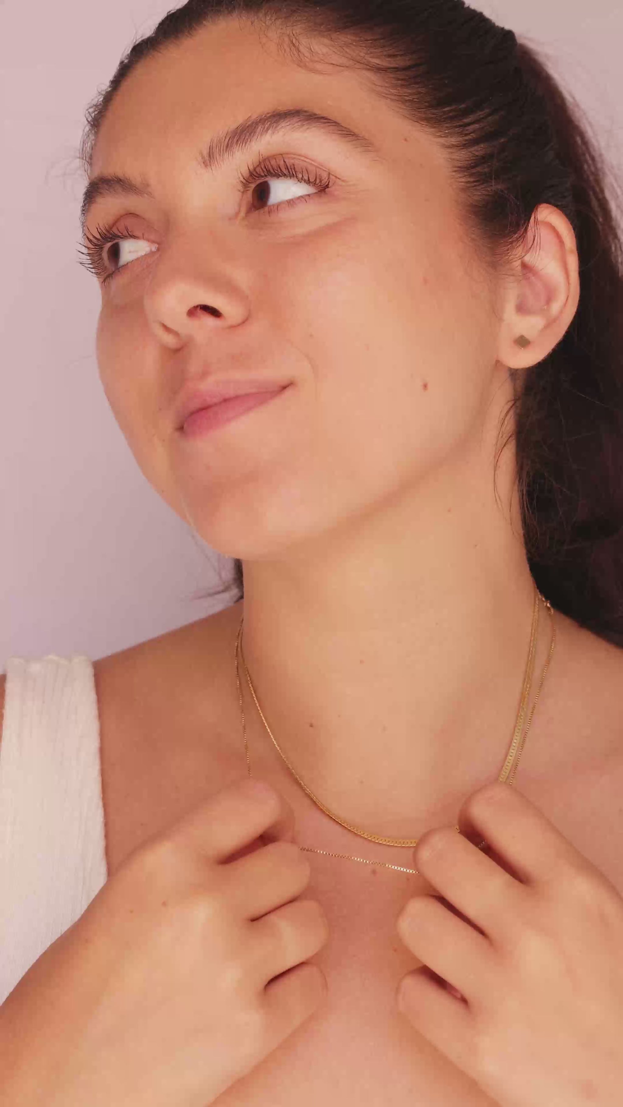 Model wearing the LucyKitty Gold Filled Square Studs and Mira Herringbone Necklace